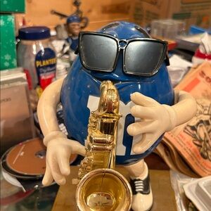 Blue and Gold Saxophone Player Sculpture